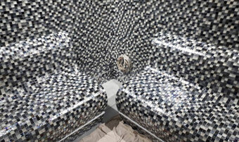 Award-winning tiler Sharon Taylor installs mosaics in steam room - JACKOBOARD® S-kit benches benefit from her expertise Award-winning tiler Sharon Taylor installs mosaics in steam room - JACKOBOARD® S-kit benches benefit from her expertise